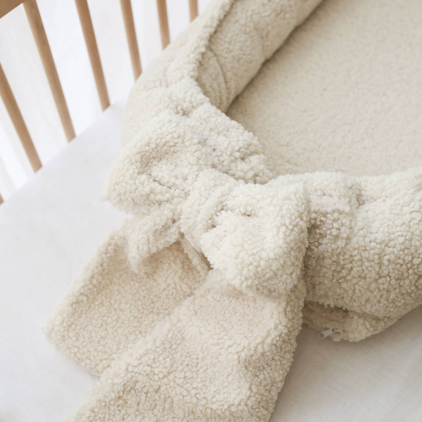 Baby nest teddy crema con fiocco