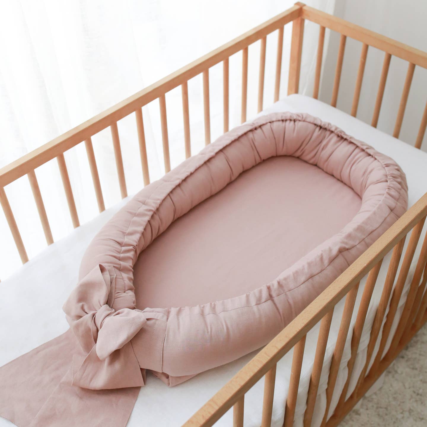 Baby nest con fiocco rosa